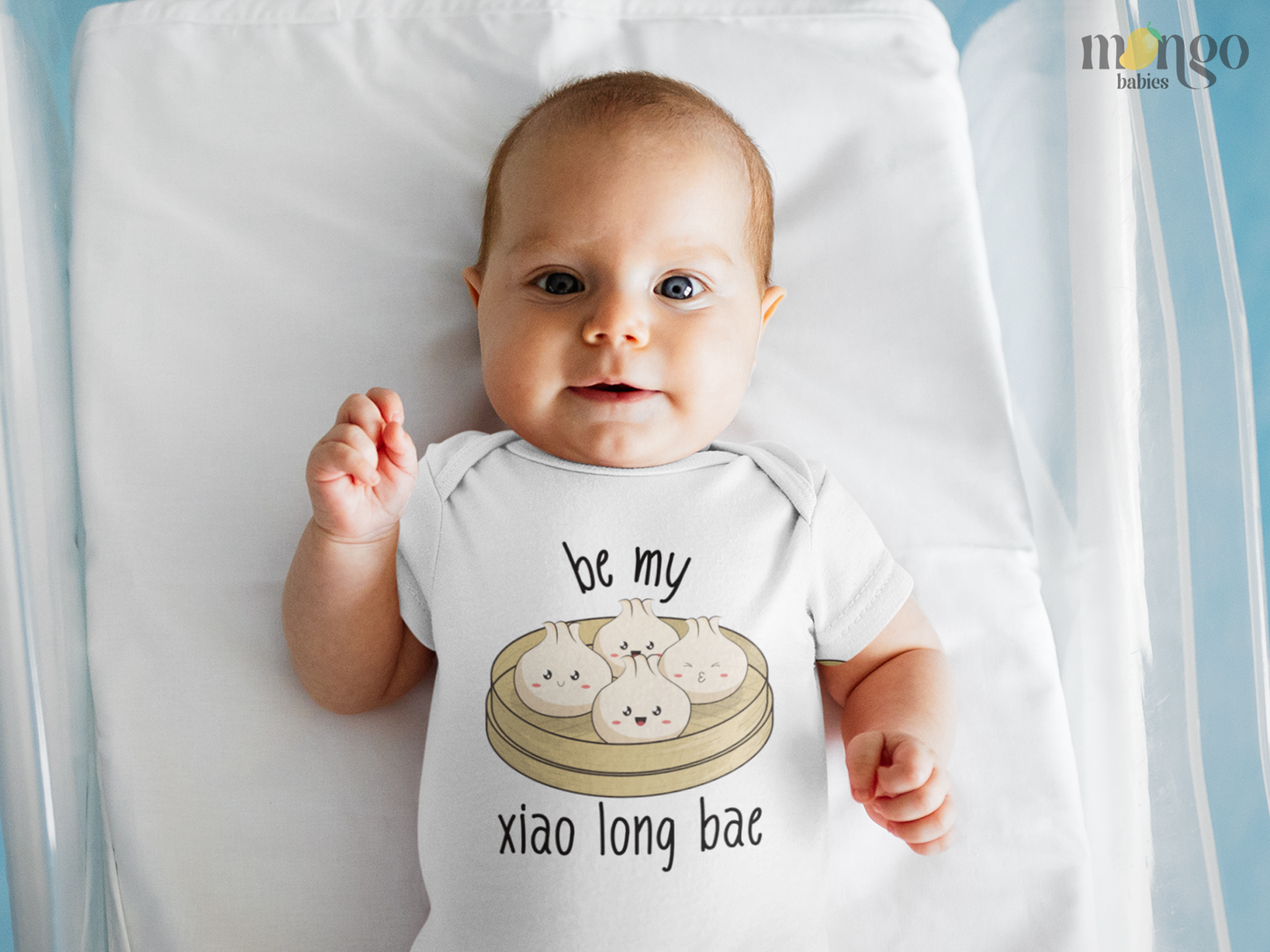 Cute dumpling graphic with “Be My Xiao Long Bae” text printed on baby bodysuit, kids’ T-shirt, children’s sweater, and unisex adult shirt.