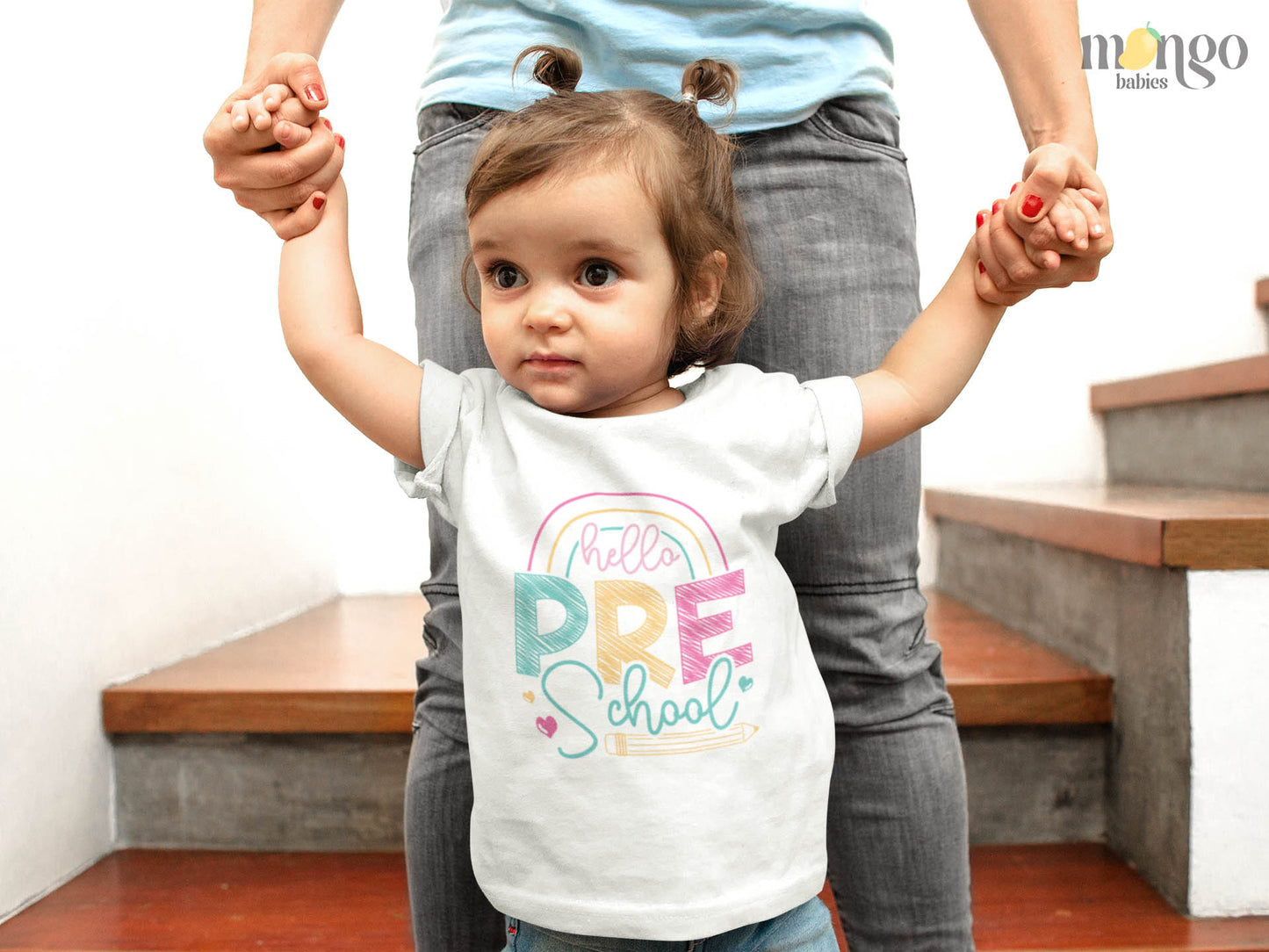 Cute rainbow and pencil “Hello Preschool” design printed on baby bodysuit, kids’ T-shirt, children’s sweater, and unisex adult shirt.