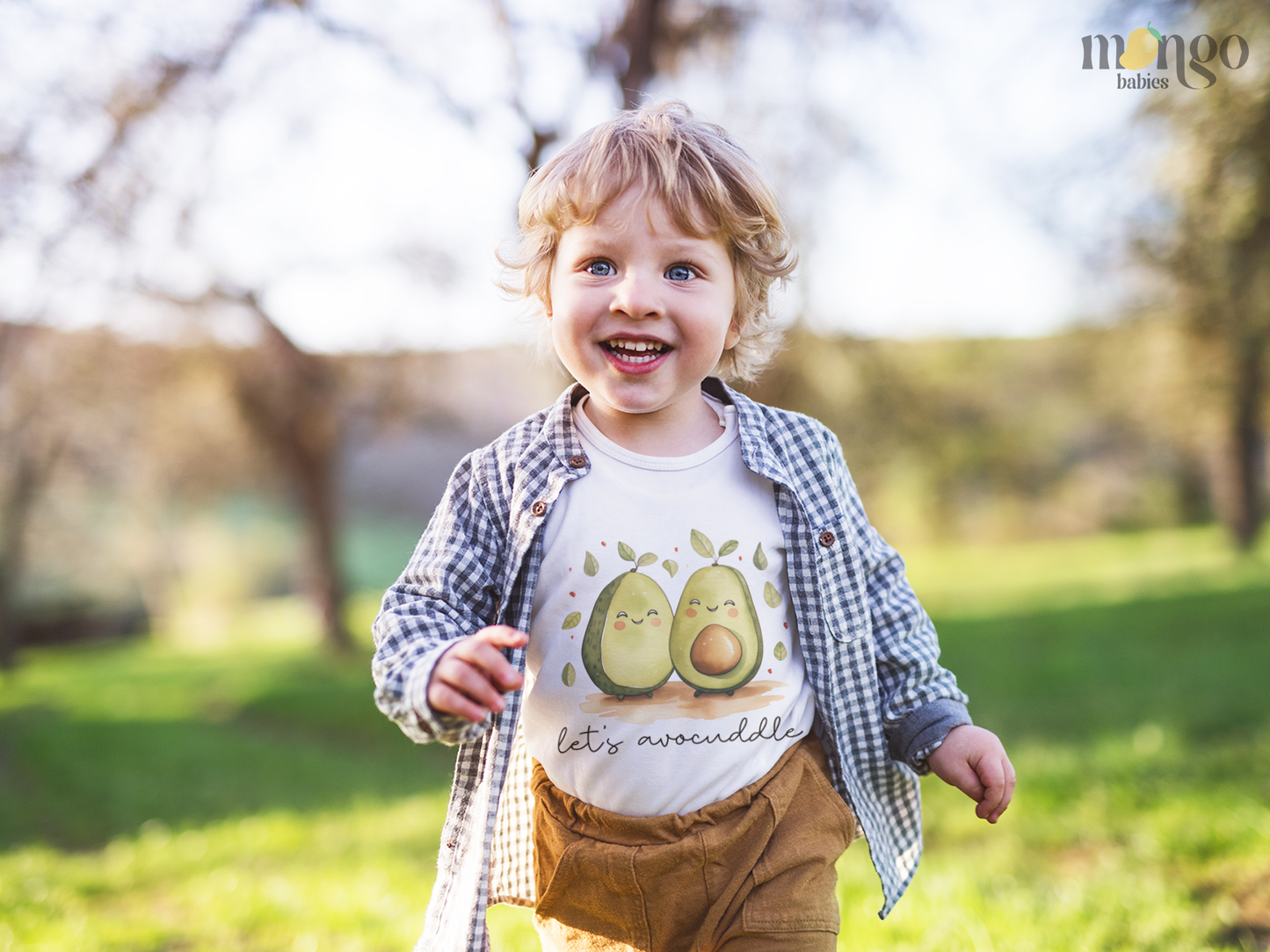 Cute avocado graphic with text “Let’s Avocuddle” printed on baby bodysuit, kids’ T-shirt, sweater, and unisex adult shirt.