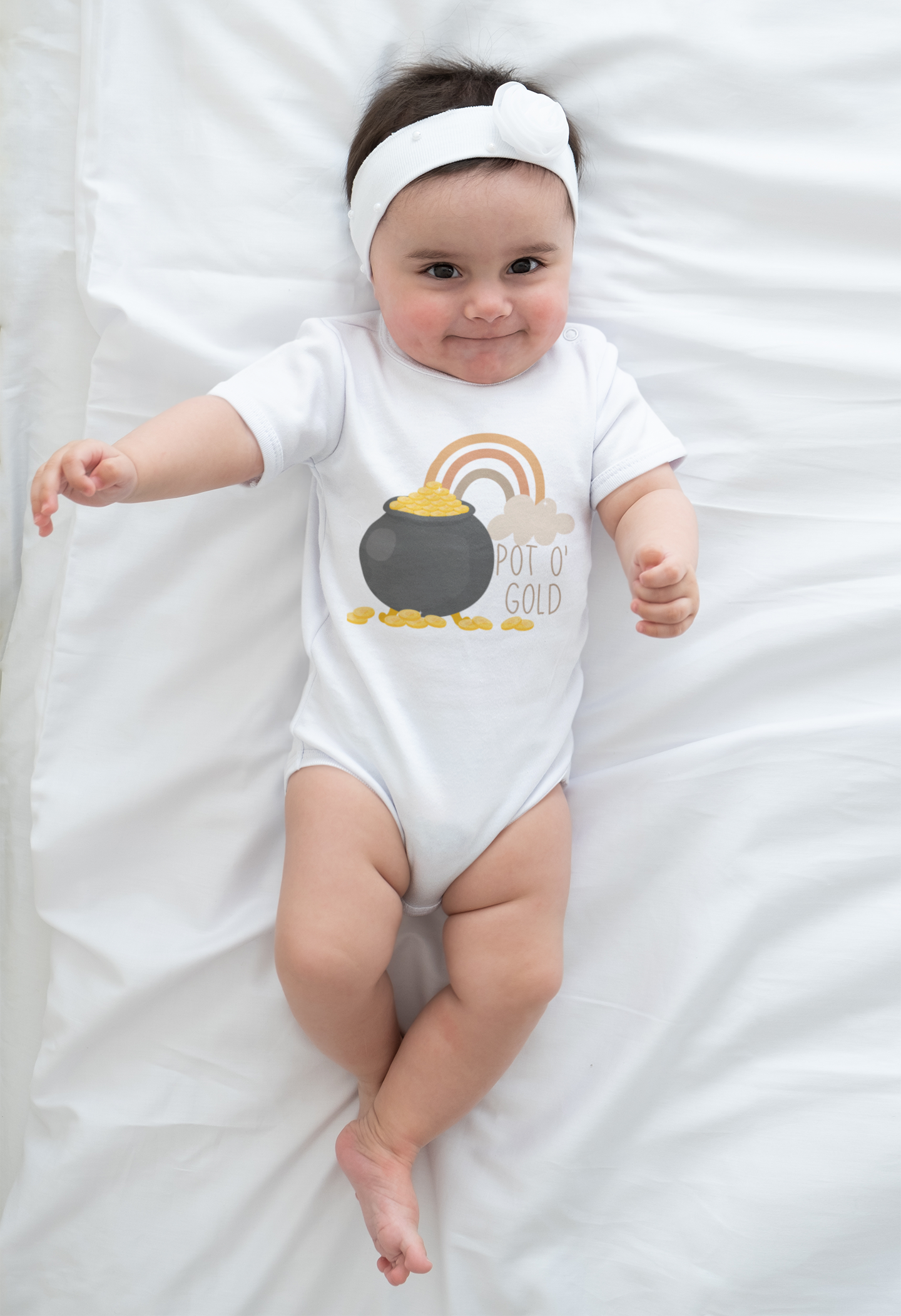 Pastel rainbow with pot of gold design and “Pot O’ Gold” text printed on baby onesie, toddler t-shirt, and kids’ shirt.