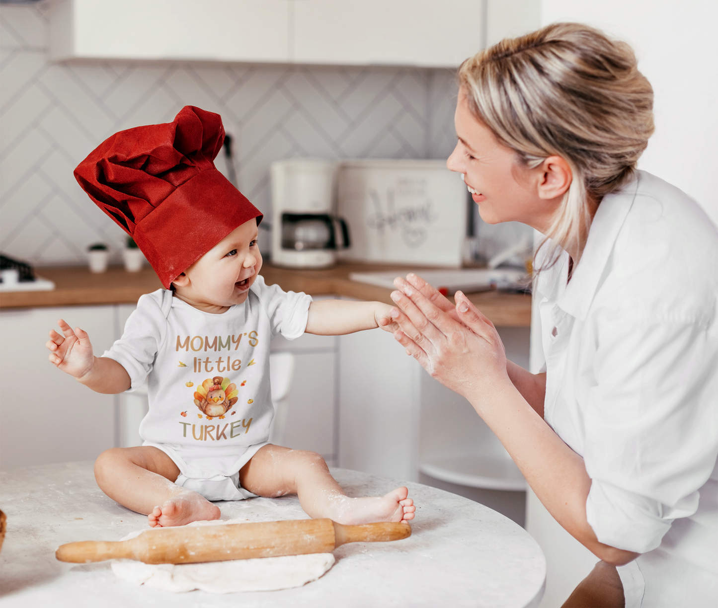 Thanksgiving baby bodysuit and kids t-shirt with “Mommy’s Little Turkey” text design