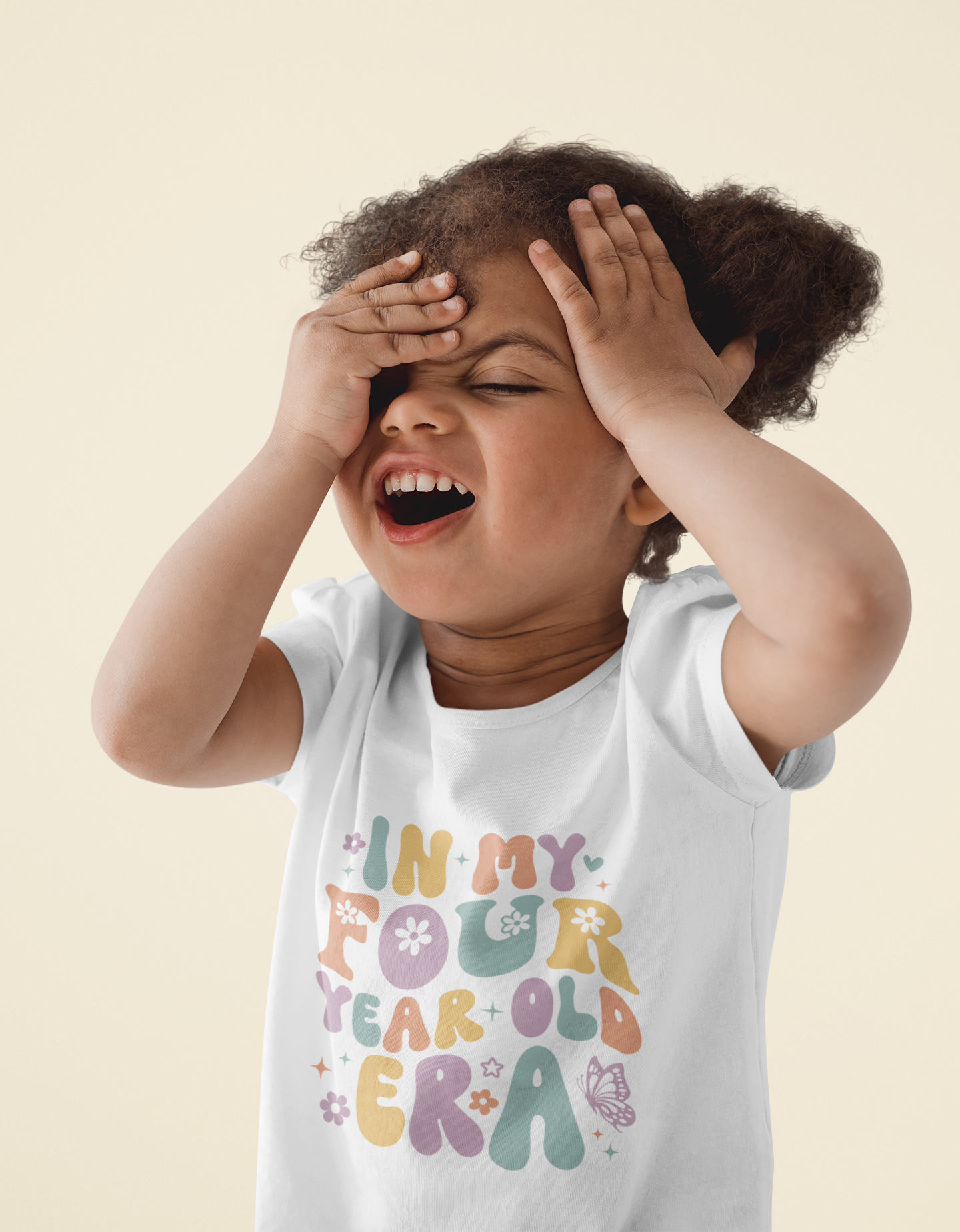 Retro pastel “In My Four Year Old Era” shirt with flowers and butterflies, available in kids’ T-shirts.