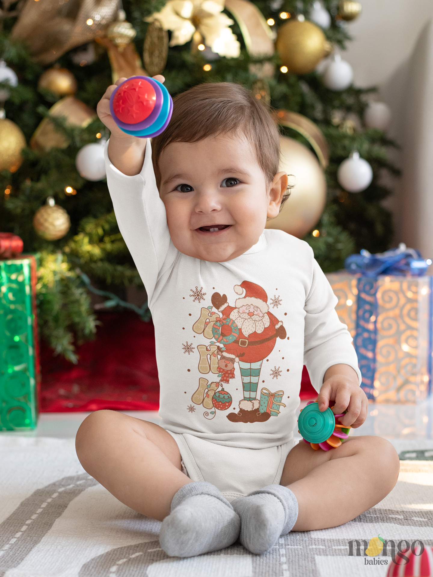 Retro Santa Claus illustration with “Ho Ho Ho” text on Christmas-themed baby onesie, toddler t-shirt, and kids’ shirt.