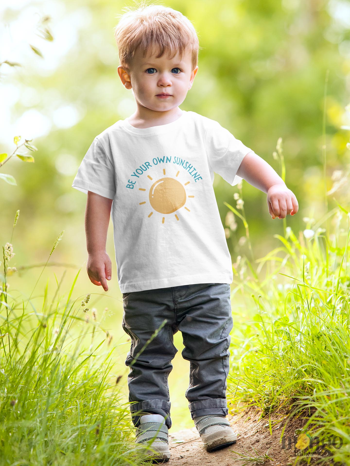 Kid's t-shirt featuring an adorable printed graphic of a sun with the empowering text 'Be Your Own Sunshine.' Encourage positivity and self-confidence with this delightful tee.