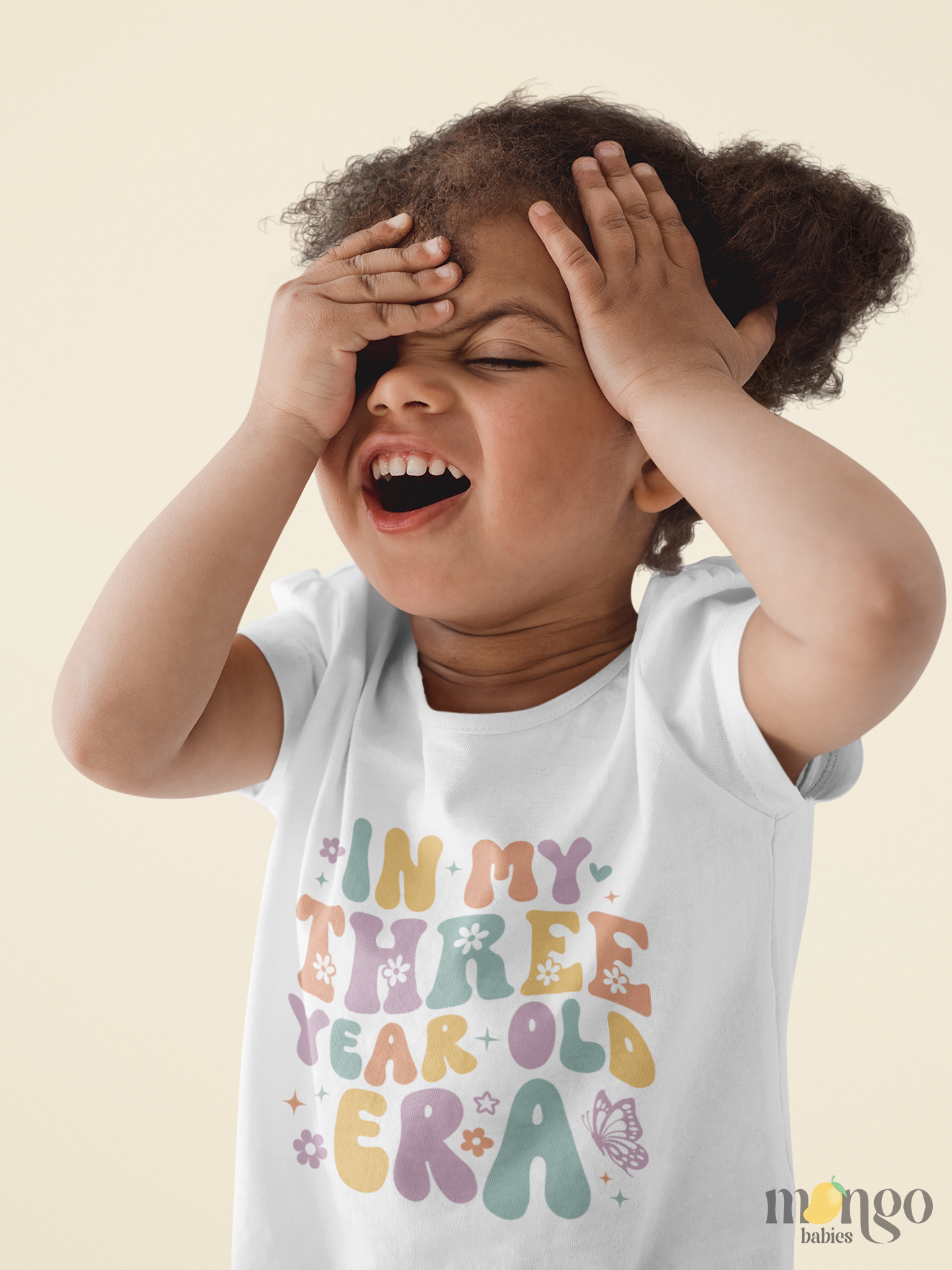 Retro pastel “In My Three Year Old Era” shirt with flowers and butterflies, available in kids’ T-shirts.