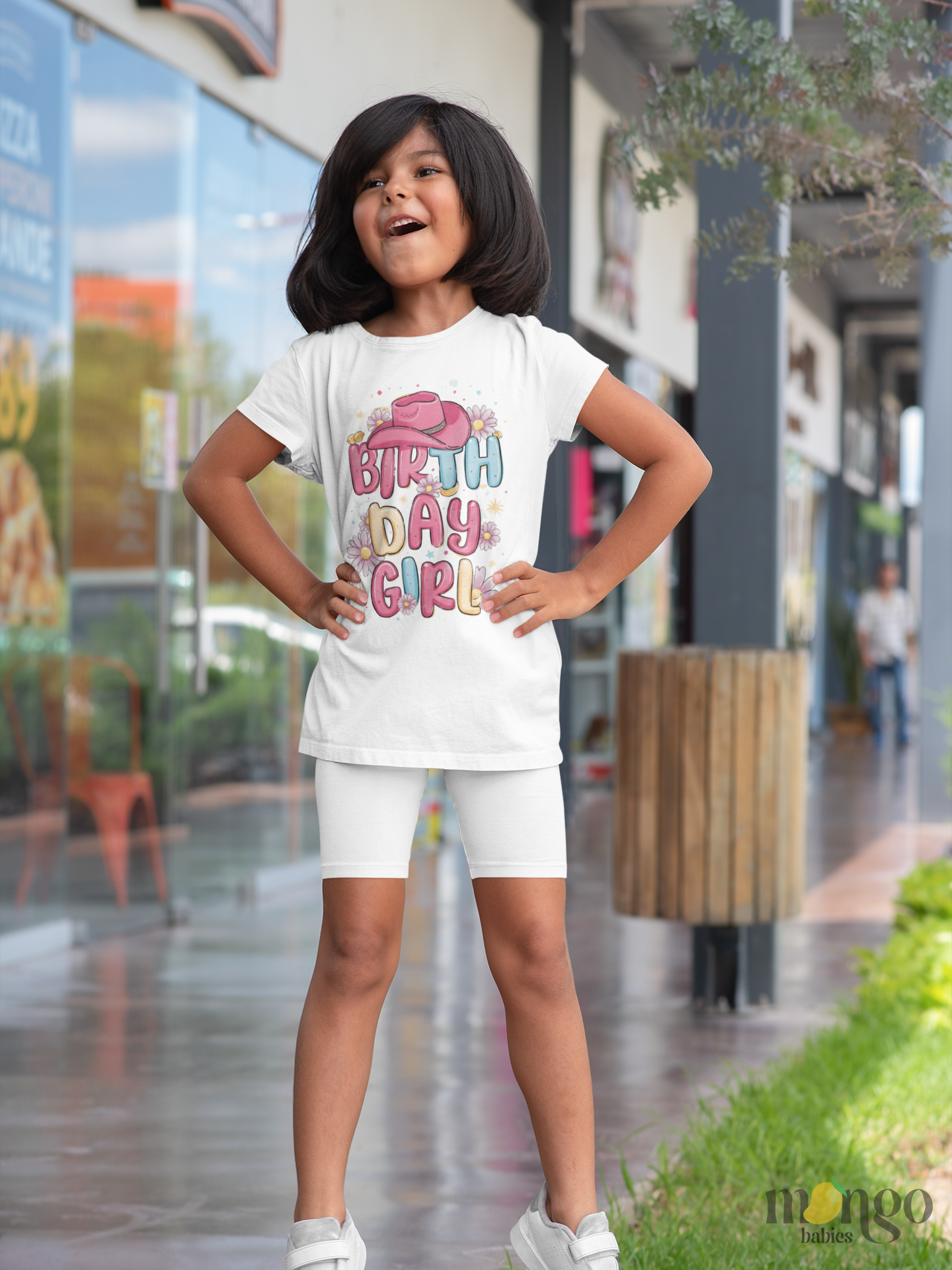 Western-style “Birthday Girl” shirt with pink text and cowboy hat graphic. Available as baby bodysuit, toddler tee, and kids’ T-shirt.