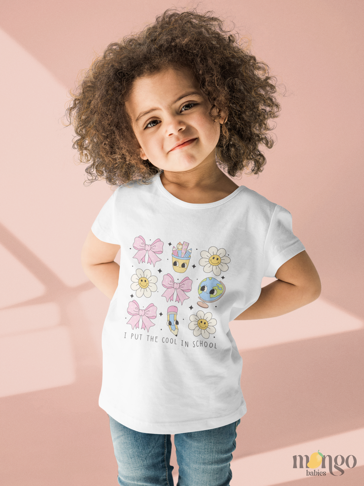 “I Put the Cool in School” shirt with pink bows, flowers, pencils, and globes, printed on toddler and kids’ T-shirts and children’s sweaters.