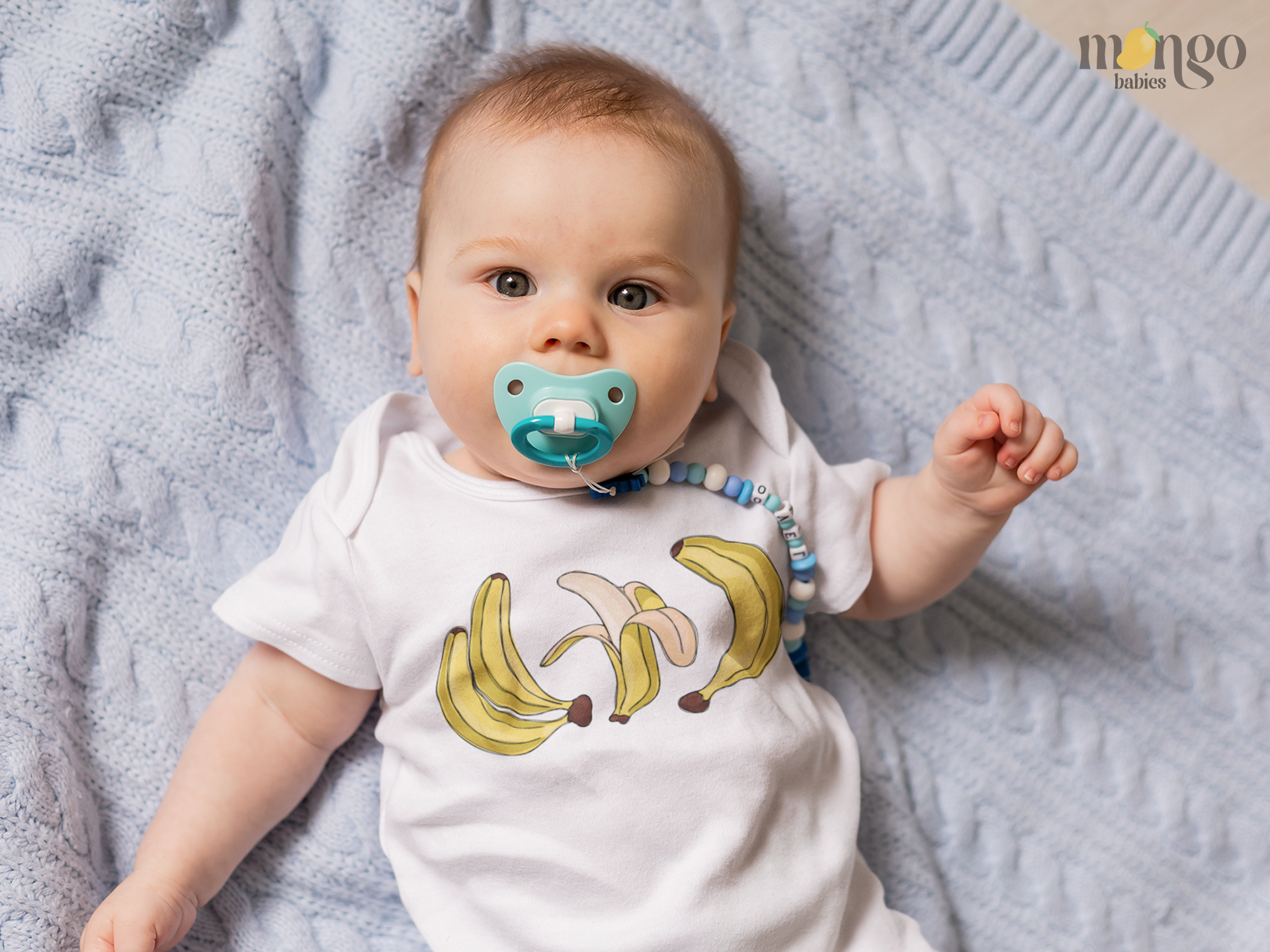 Playful banana bunch design on soft, comfy apparel for babies, kids & adults. Bodysuits, tees, and sweaters made to match and make everyone smile!
