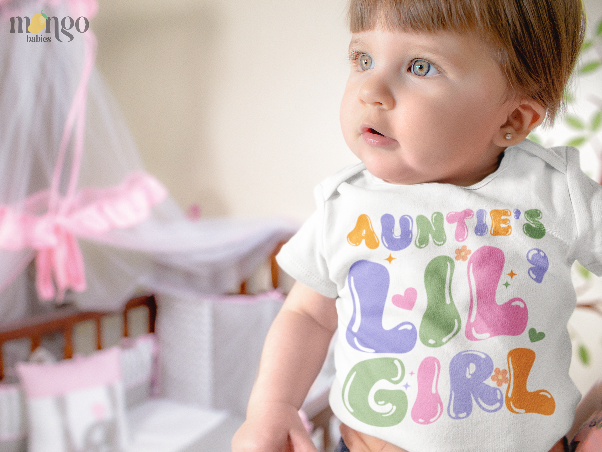 Retro “Auntie’s lil girl” text design on baby bodysuit, kids’ t-shirt, children’s sweatshirt, and unisex adult shirt.