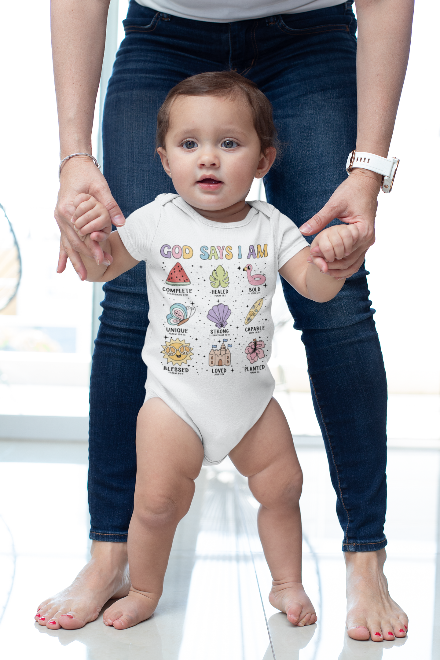 “God Says I Am” beach-themed baby onesie and kids’ T-shirt with colorful seashells, starfish, and tropical icons. Soft cotton, unisex fit.
