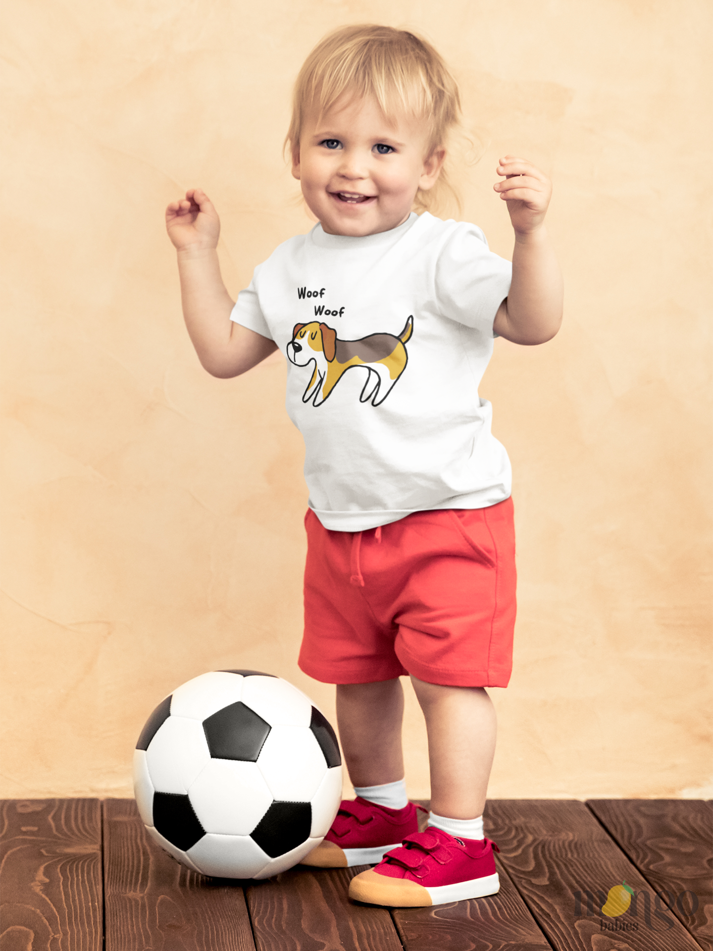 Baby onesie and kids’ t-shirt with a cute dog graphic and “Woof Woof” text, made from soft cotton.
