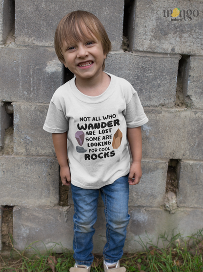 Baby onesie and kids’ T-shirt with “Looking for Cool Rocks” text and colorful gem illustrations. Perfect outfit for young nature explorers.
