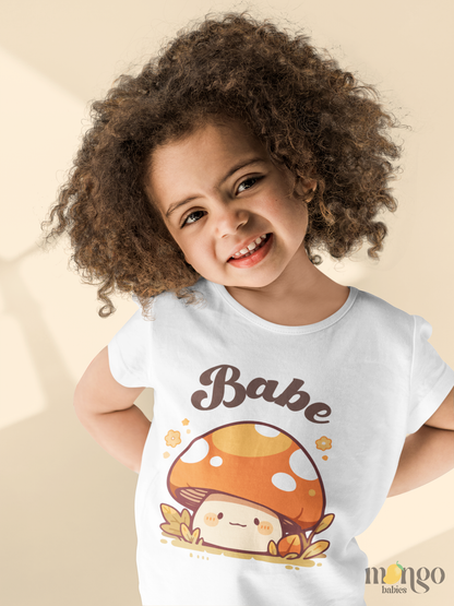 Cute mushroom graphic with the word "Babe" printed on baby bodysuit, kids t-shirt, toddler sweatshirt, and adult unisex shirt.