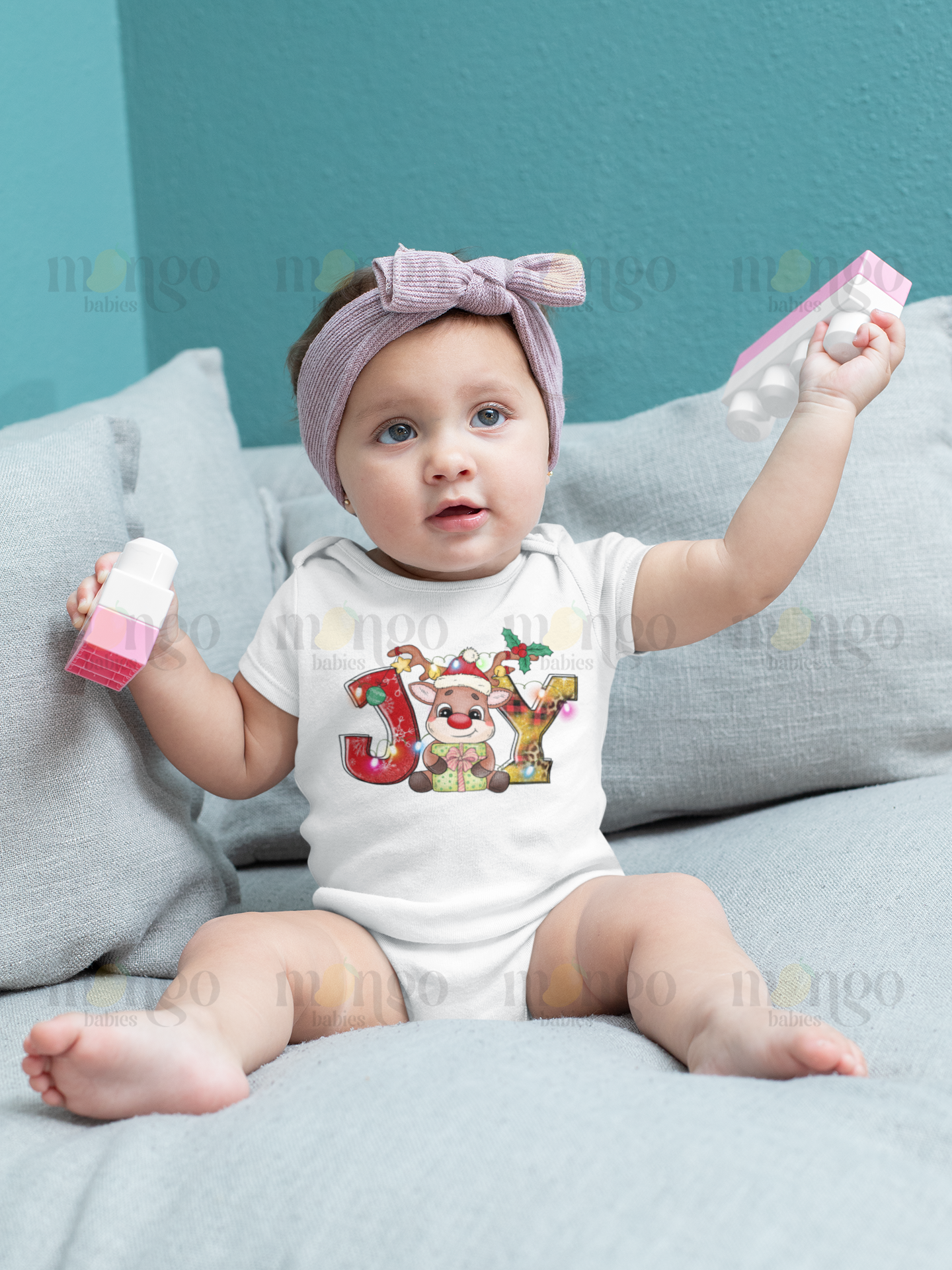 Cute Christmas reindeer “JOY” design on baby onesie, kids t-shirt, adult shirt, and children sweatshirt.
