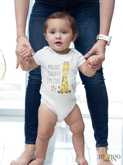 Cute giraffe graphic with text "You bet giraffe I'm cute" printed on baby bodysuit, kids’ t-shirt, sweatshirt, and adult shirt.