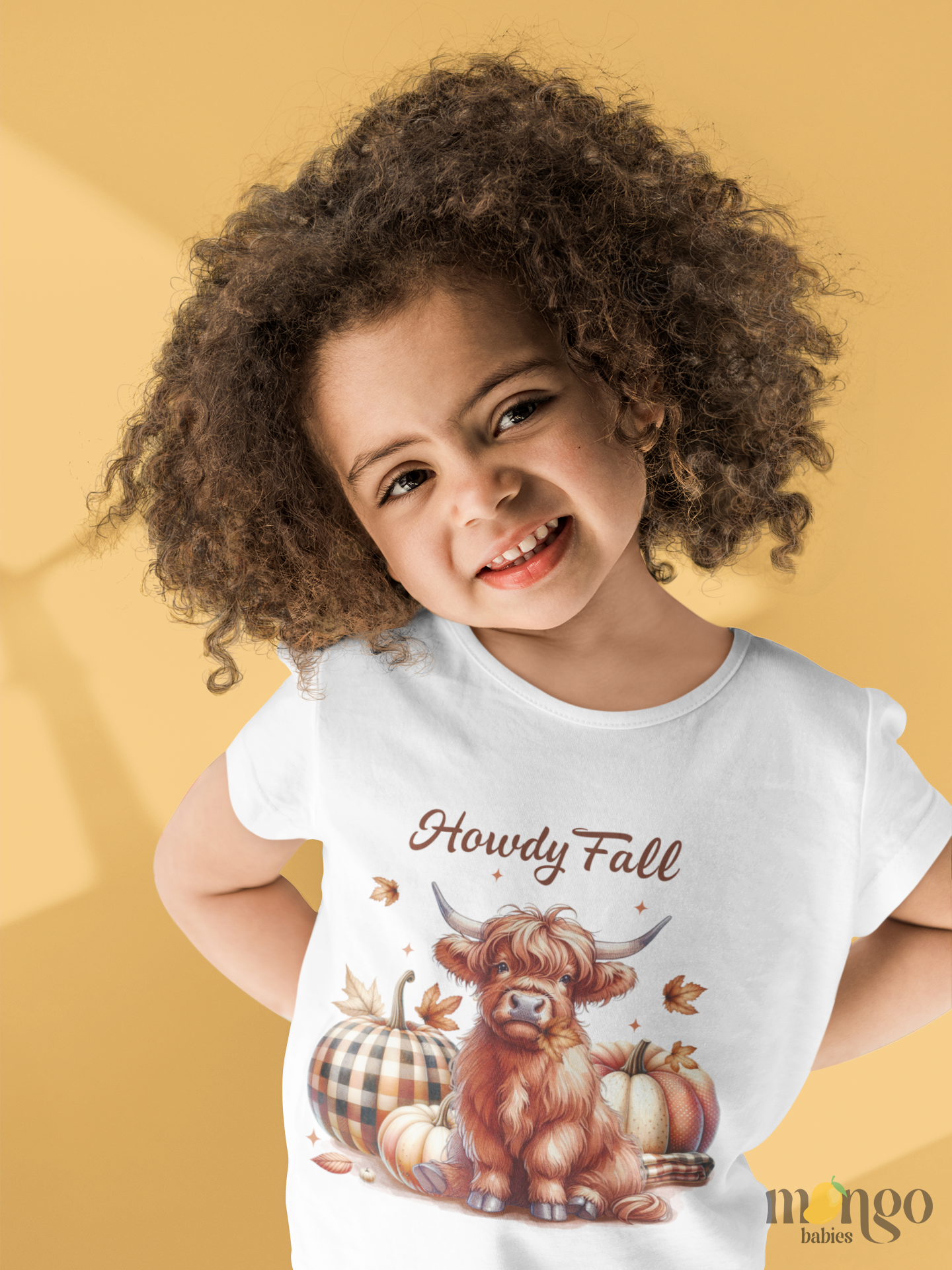 Retro “Howdy Fall” shirt with a vintage heifer illustration. Available as baby onesie, toddler tee, and kids’ T-shirt.
