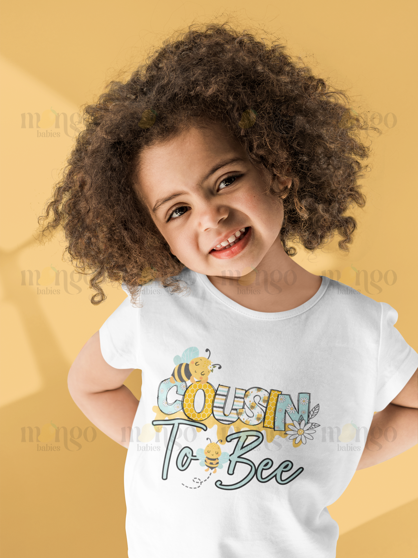 Cute bee design with “Cousin to Bee” text on baby bodysuit, kids t-shirt, adult shirt, and children’s sweatshirt for baby announcement.