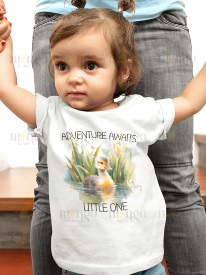 Cute duck graphic with the text “Adventure awaits little one” printed on baby bodysuit, toddler t-shirt, kids tee, children sweatshirt, and unisex adult shirt.