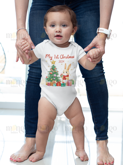 Cute Christmas rabbit design with text “My 1st Christmas 2025” printed on baby bodysuit, kids t-shirt, children sweatshirt, and unisex adult shirt.