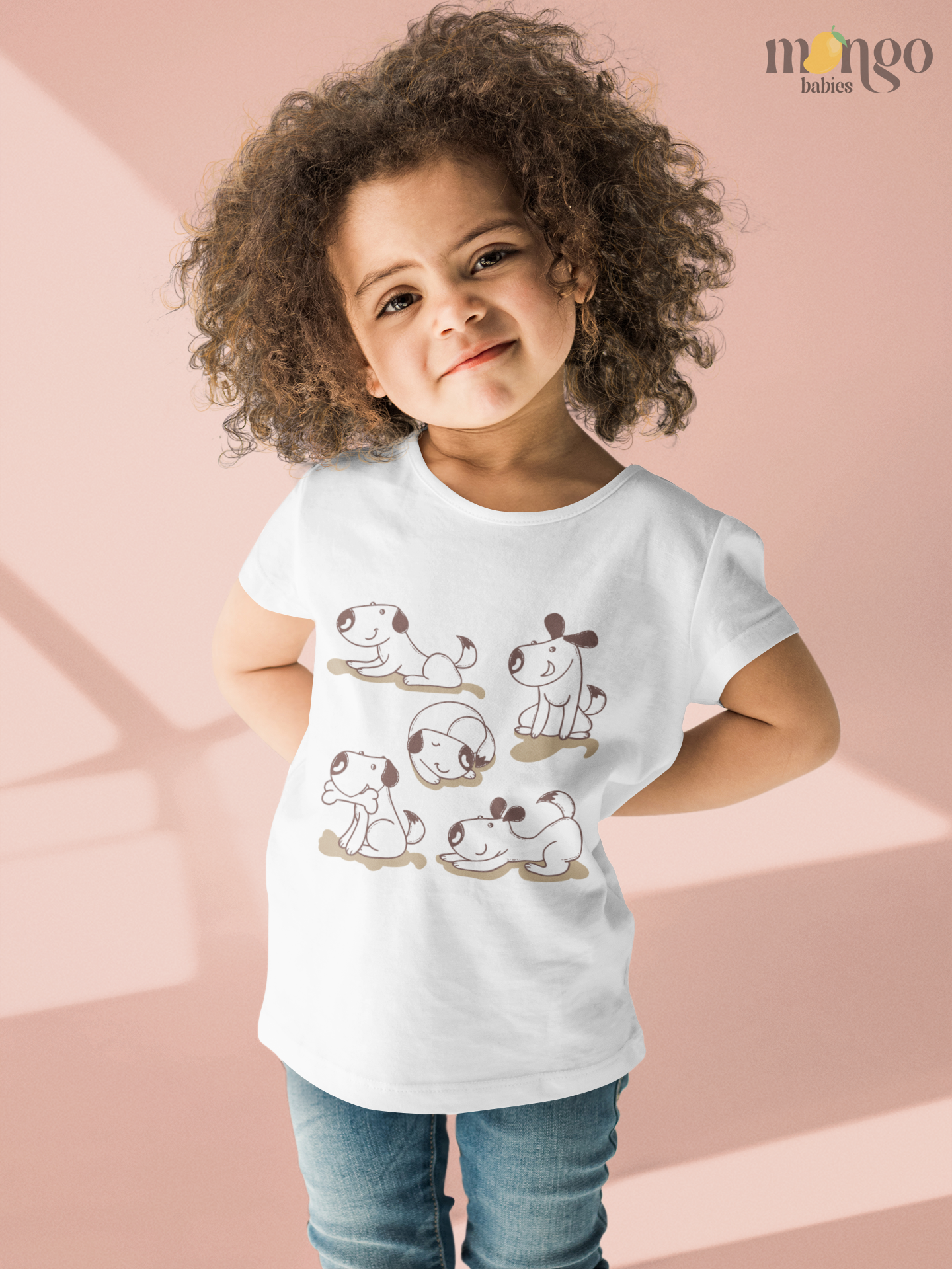 Cute dog design printed on baby onesie, toddler T-shirt, and kids’ shirt. Features playful dogs in different poses on soft cotton fabric.
