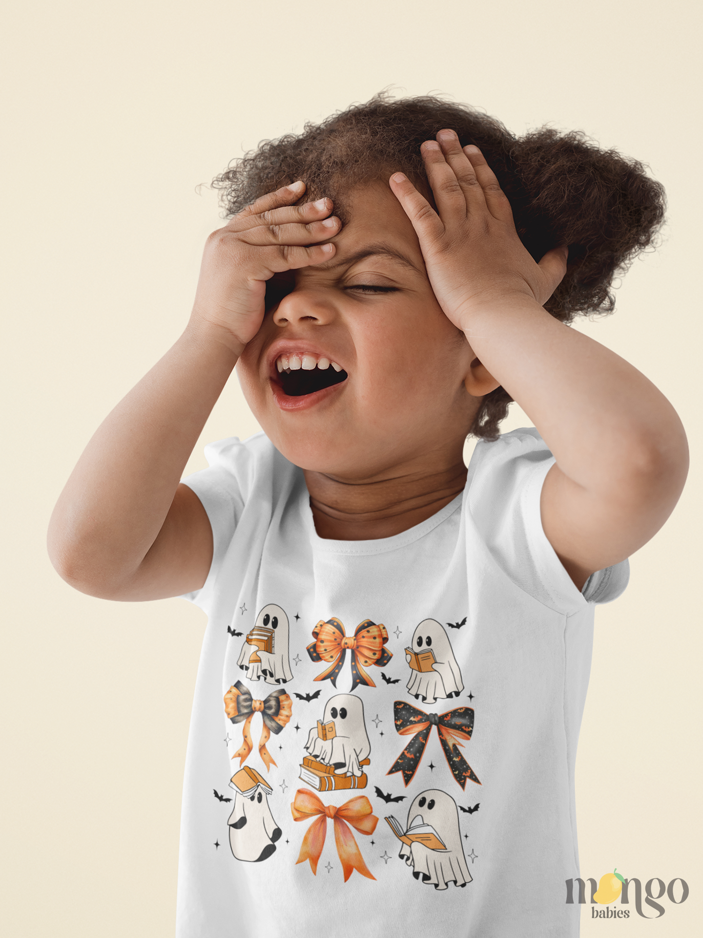 Halloween-themed shirt with cute ghosts reading books and wearing orange bows. Printed design available on baby onesies, toddler, and kids’ T-shirts.

