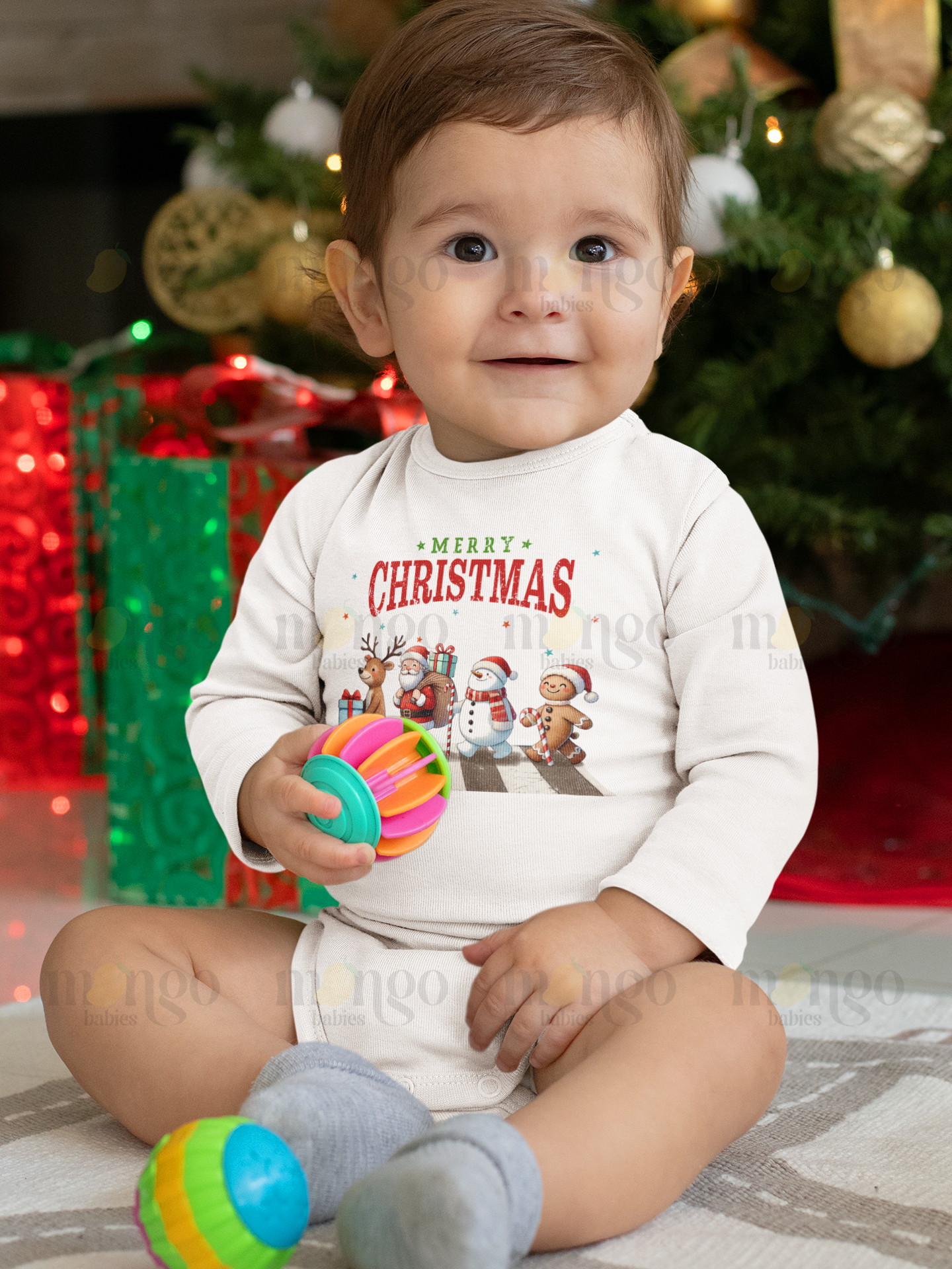 Christmas shirt with reindeer, Santa Claus, snowman, and gingerbread design and “Merry Christmas” text for baby, kids, and adults.