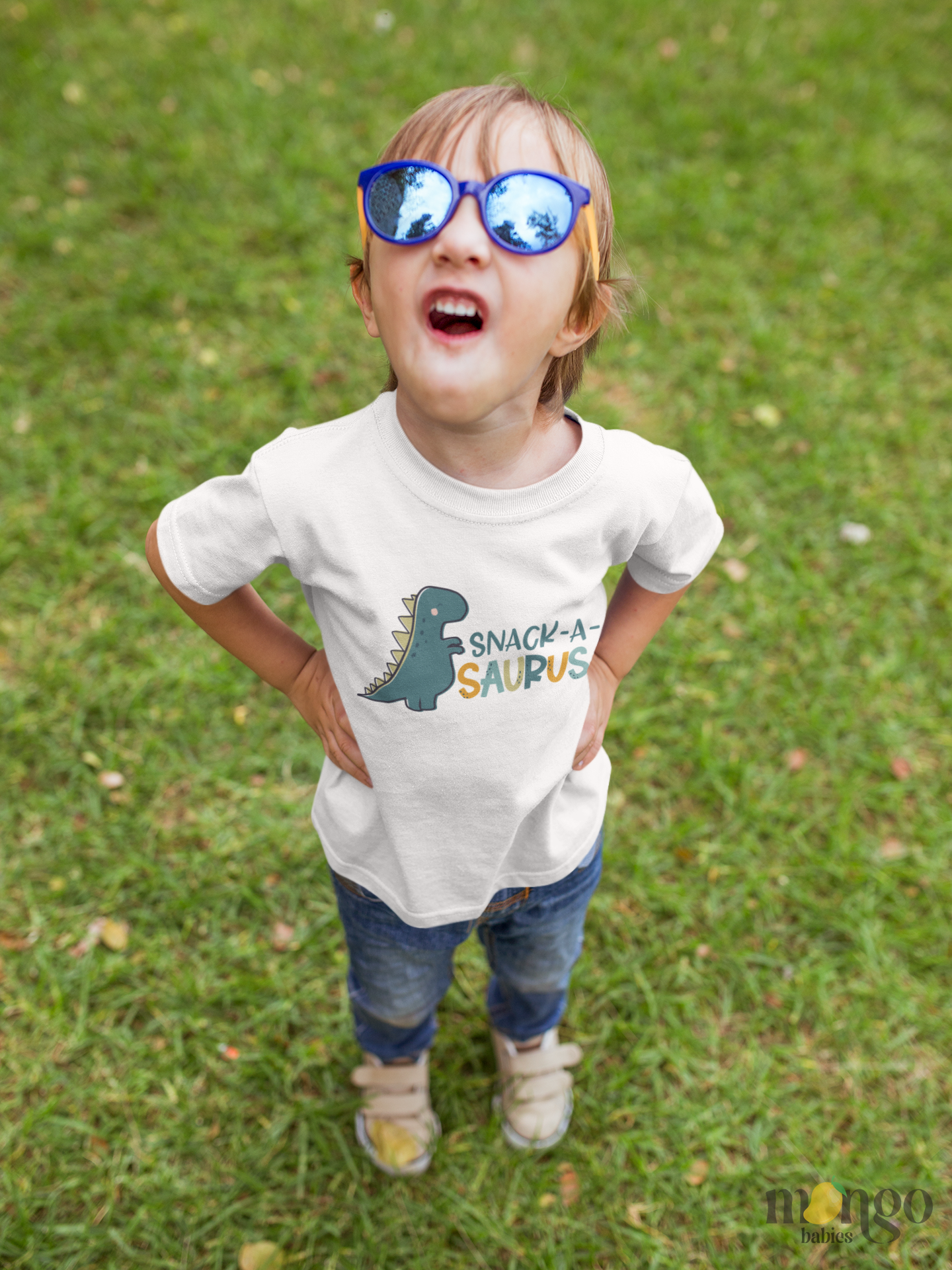 Cute “Snack-a-saurus” dinosaur design on baby onesie and kids’ t-shirt, fun snack-themed clothing for toddlers and children.
